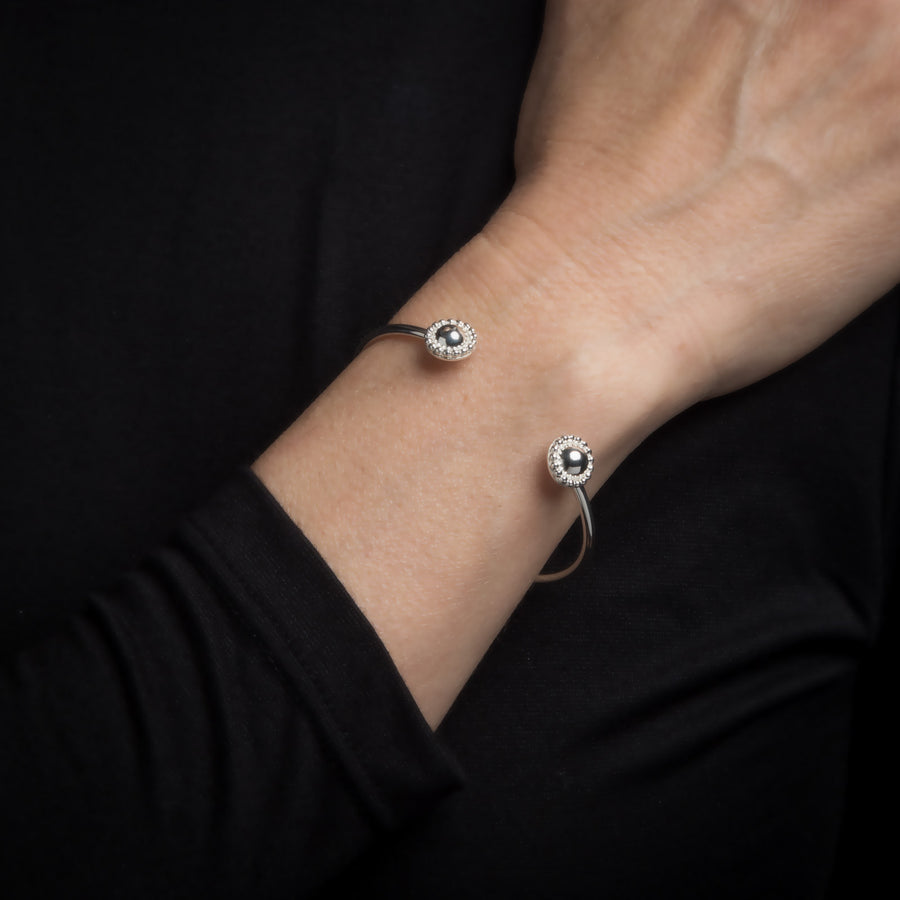 Model Wearing Reflections: Sterling Silver Mirror Finish Dome Cuff Bracelet
