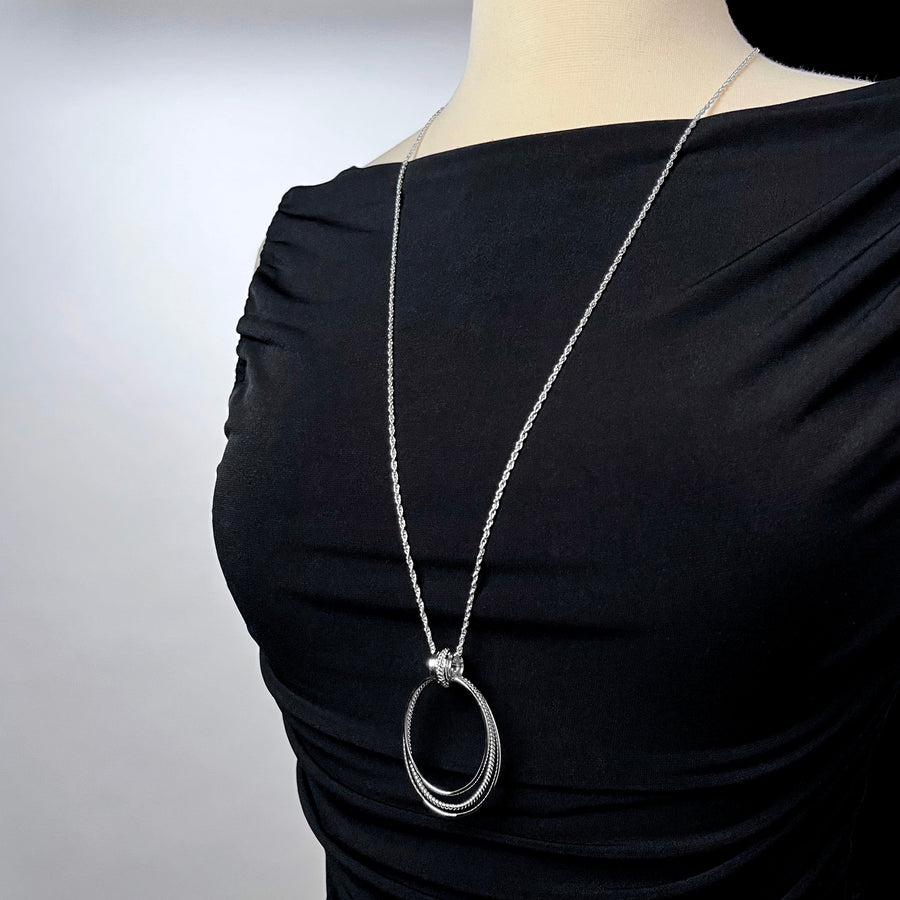 SPINNER: Long necklace with large oval hoops and spinner bail